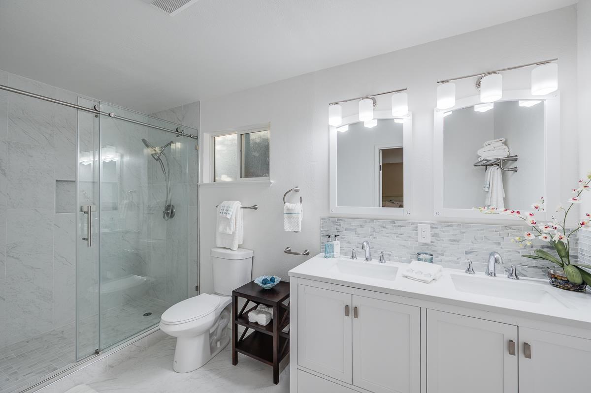 3173 Shuler Circle Marina, CA 93933 - Photo 37 of 55 a bathroom with a sink toilet a shower and a mirror