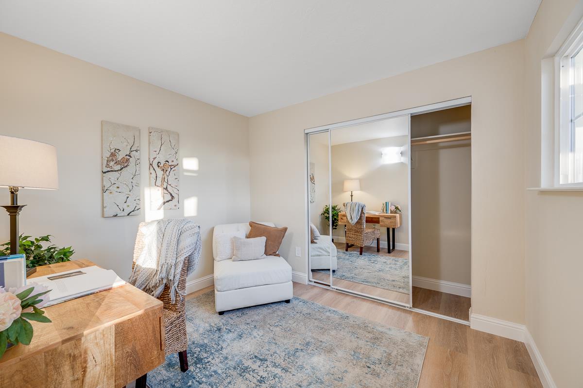 3173 Shuler Circle Marina, CA 93933 - Photo 46 of 55 a bedroom with furniture and a lamp