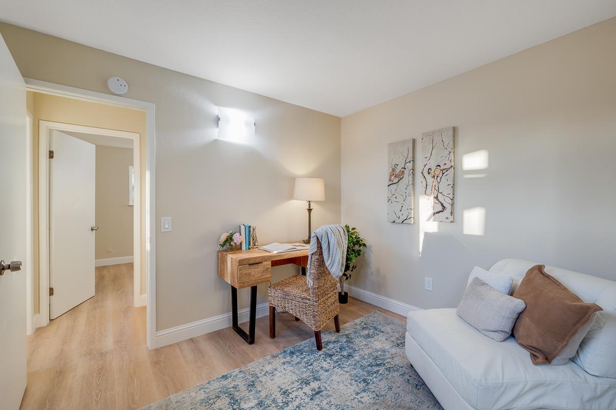 3173 Shuler Circle Marina, CA 93933 - Photo 47 of 55 a living room with furniture and a wooden floor
