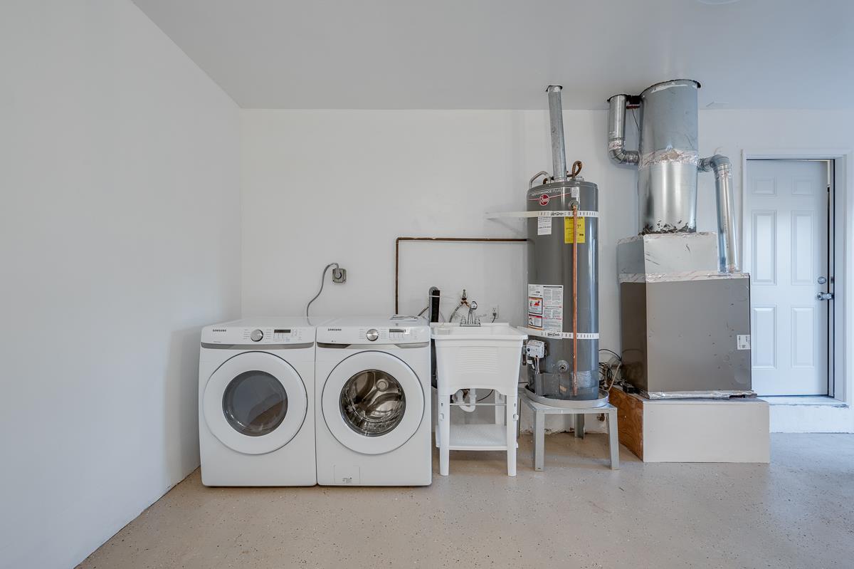 3173 Shuler Circle Marina, CA 93933 - Photo 50 of 55 a utility room with dryer and washer