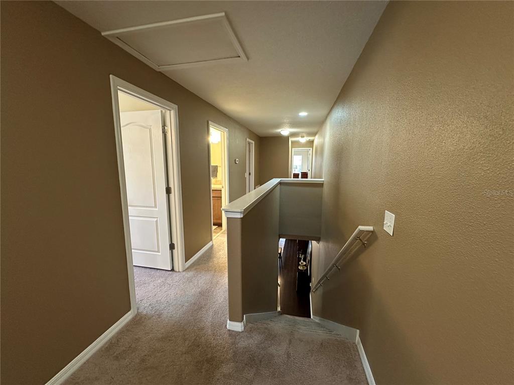 9476 Trumpet Vine Loop Trinity, FL 34655 - Photo 11 of 19 a view of a hallway with closet