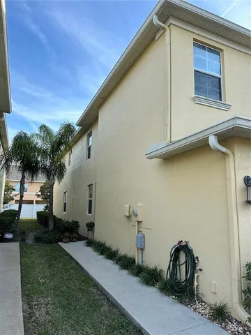 a house view with a backyard space