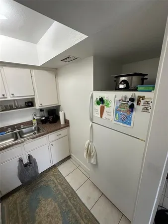 a view of a hallway with front door