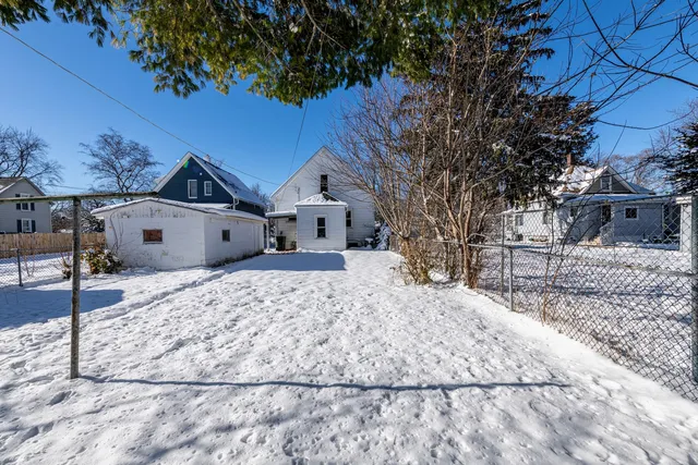 a front view of house with a yard