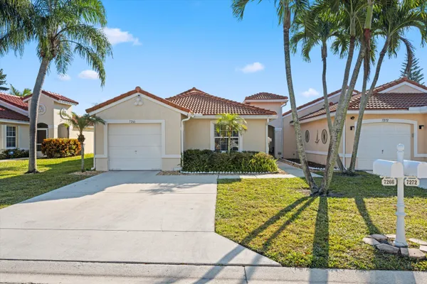 $425,000 | 7266 Burgess Drive, Lake Worth, FL 33467