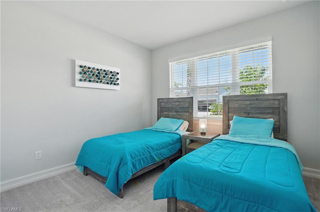 28165 Captiva Shell Loop Bonita Springs, FL 34135 - Photo 24 of 38 Bedroom with carpet flooring and baseboards