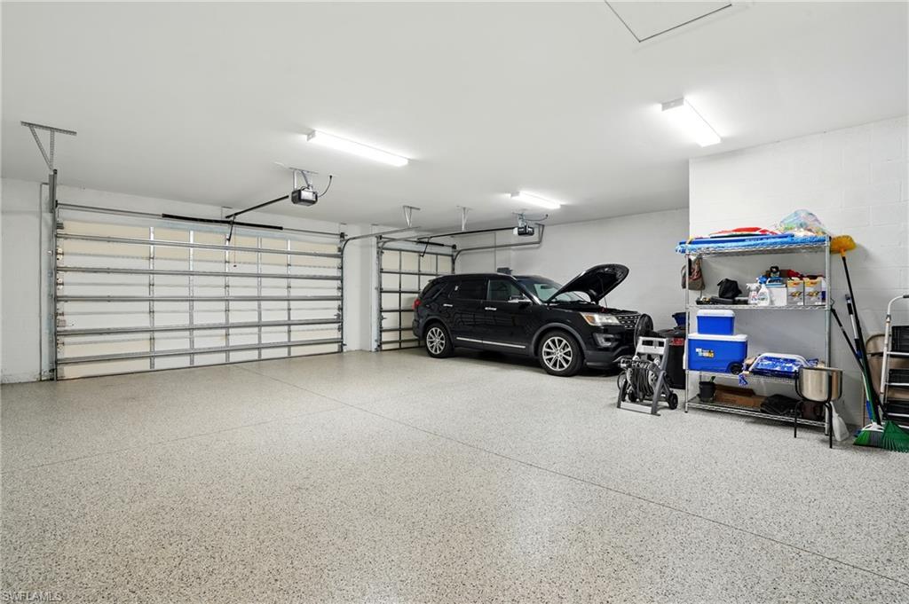 28165 Captiva Shell Loop Bonita Springs, FL 34135 - Photo 30 of 38 Pool at dusk featuring a community pool, a hot tub, and a patio area