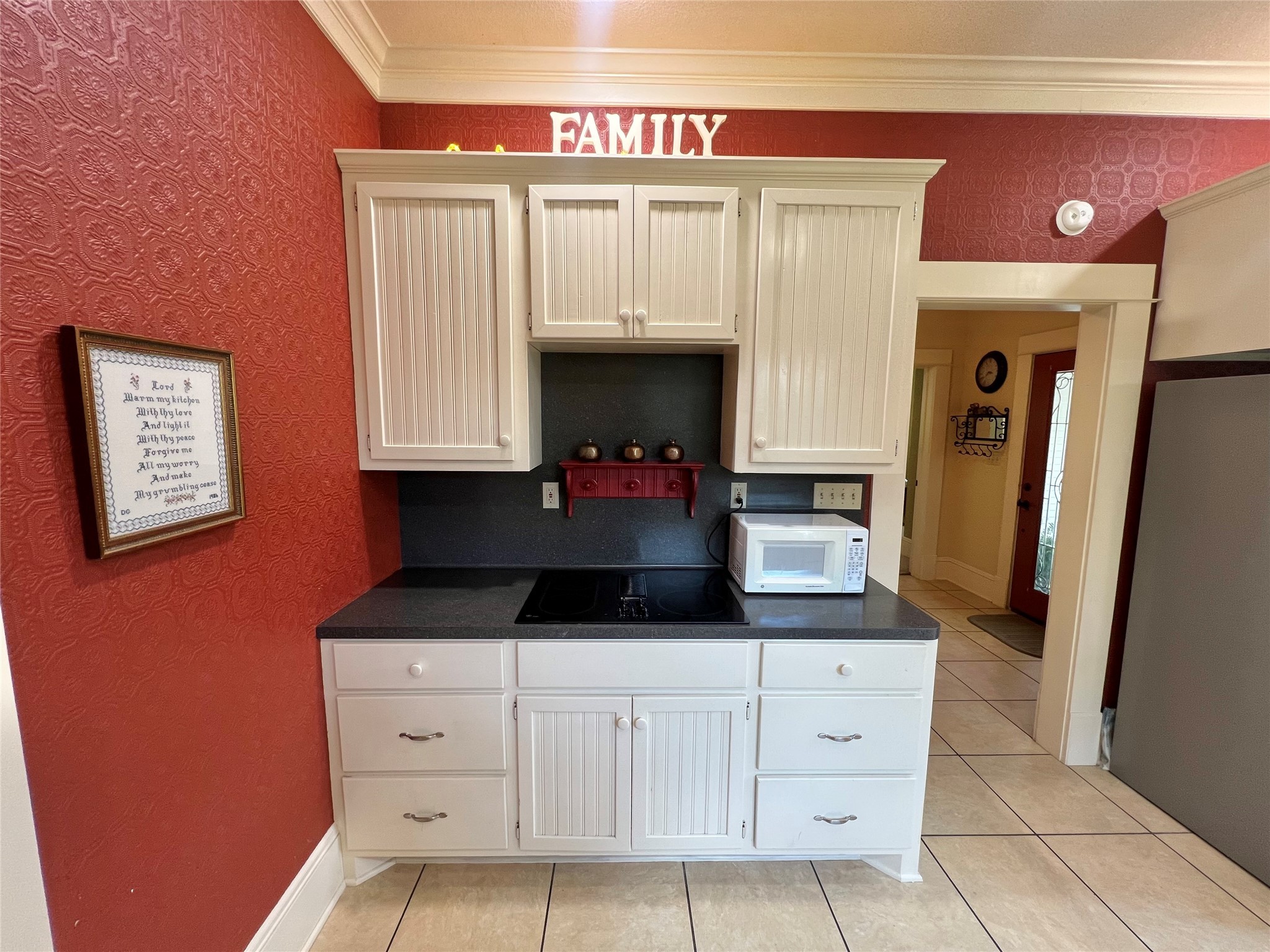 560 Jimmy Phillips Boulevard Angleton, TX 77515 - Photo 16 of 38 a kitchen with sink cabinets and stove