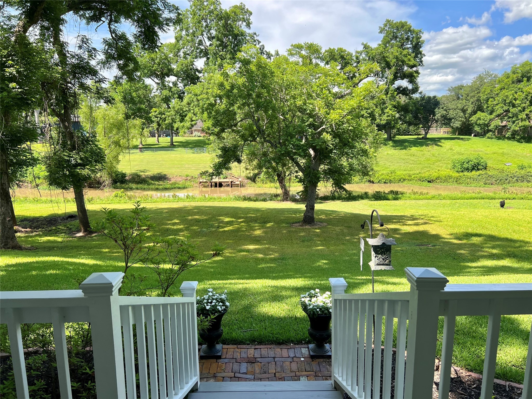 560 Jimmy Phillips Boulevard Angleton, TX 77515 - Photo 30 of 38 a view of a garden with an outdoor space