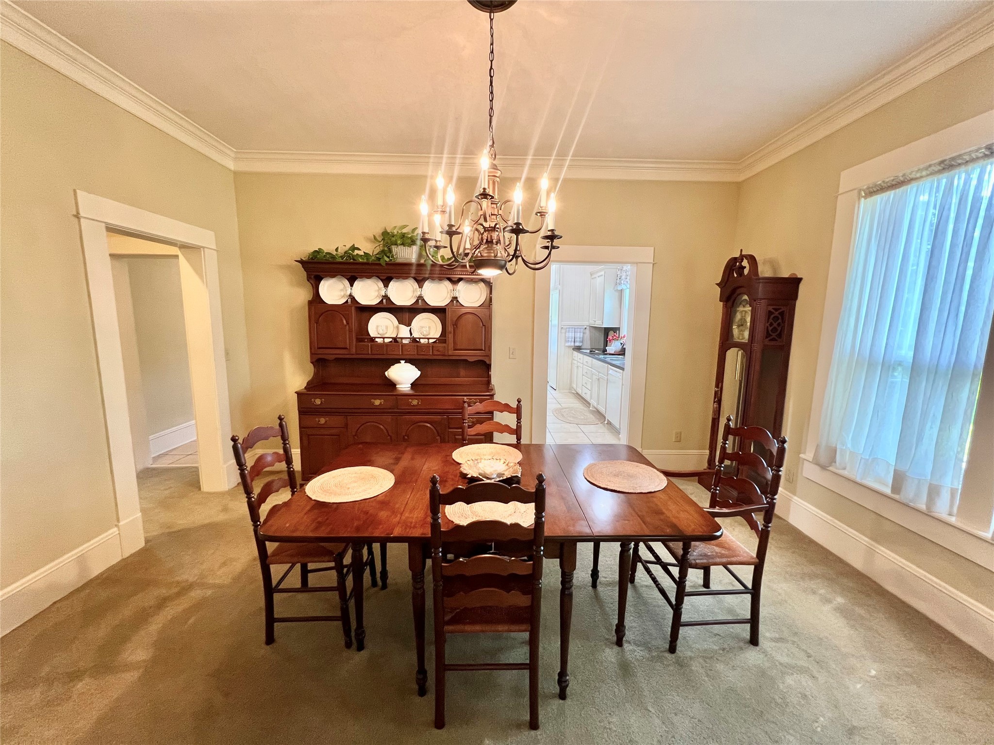 560 Jimmy Phillips Boulevard Angleton, TX 77515 - Photo 10 of 38 a view of a dining room with furniture and chandelier