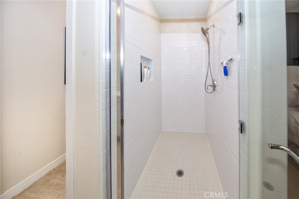 27466 Mercantile Court, Unit 101 Valencia, CA 91381 - Photo 12 of 21 a bathroom with a shower