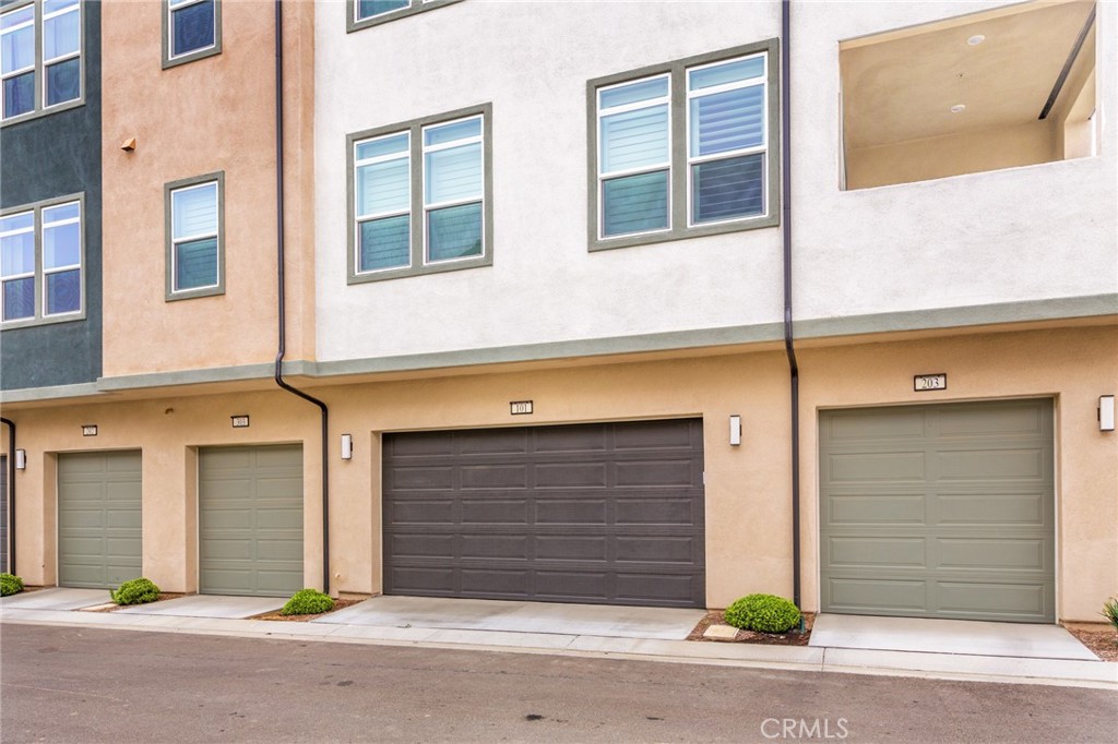 27466 Mercantile Court, Unit 101 Valencia, CA 91381 - Photo 19 of 21 a view of brick building with a road