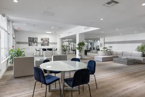 swimming pool view with a lake view