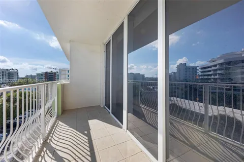 a balcony with view of city from a balcony