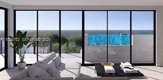 28597 Peg Leg Road Summerland Key, FL 33042 - Photo 13 of 20 a picture of water heater room with a floor to ceiling window