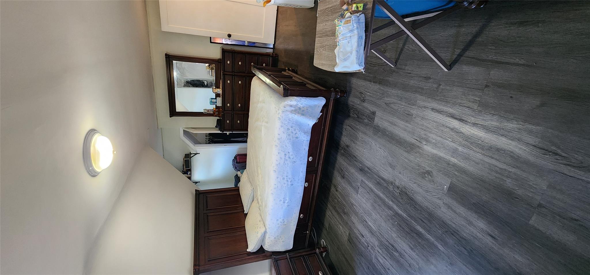 182 Long Beach Road Hempstead, NY 11550 - Photo 13 of 24 a bedroom with a bed and window