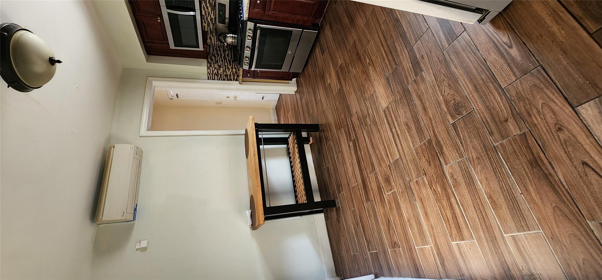 182 Long Beach Road Hempstead, NY 11550 - Photo 24 of 24 a view of kitchen with sink and microwave