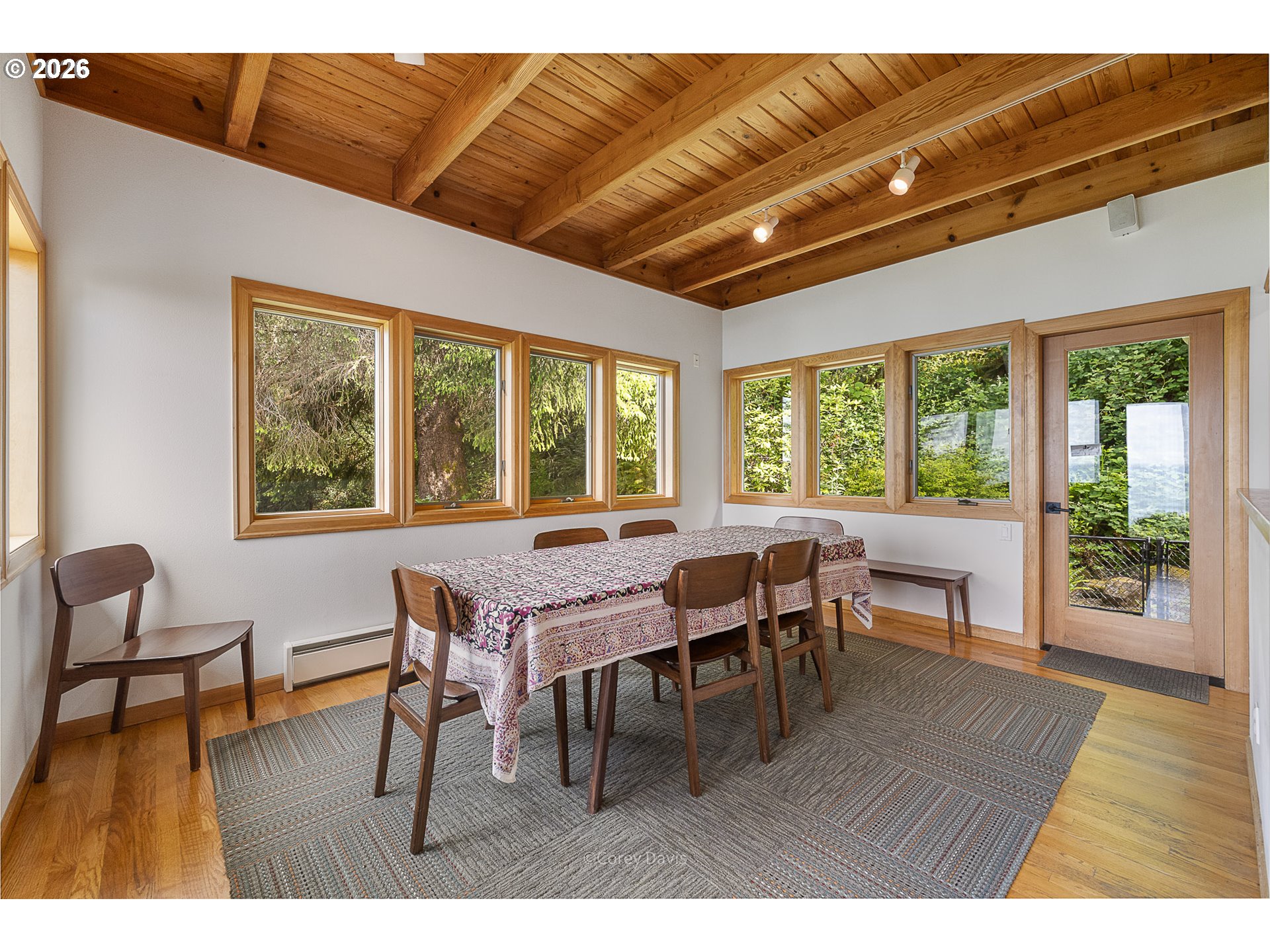38295 Beulah Reed Road Nehalem, OR 97131 - Photo 19 of 42 a dining room with furniture window wooden floor