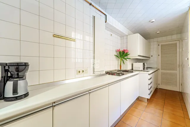 a view of balcony with wooden floor