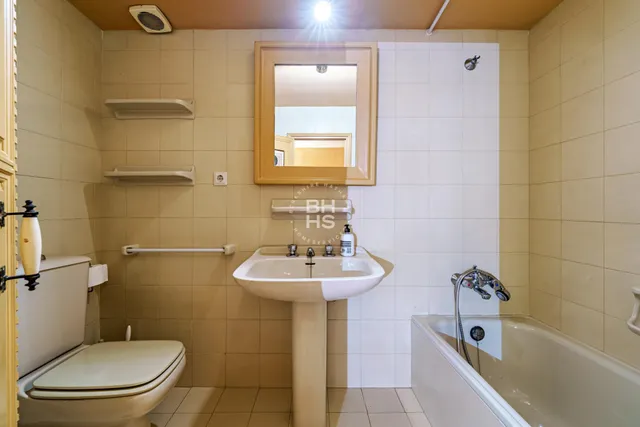 a view of a balcony with trees