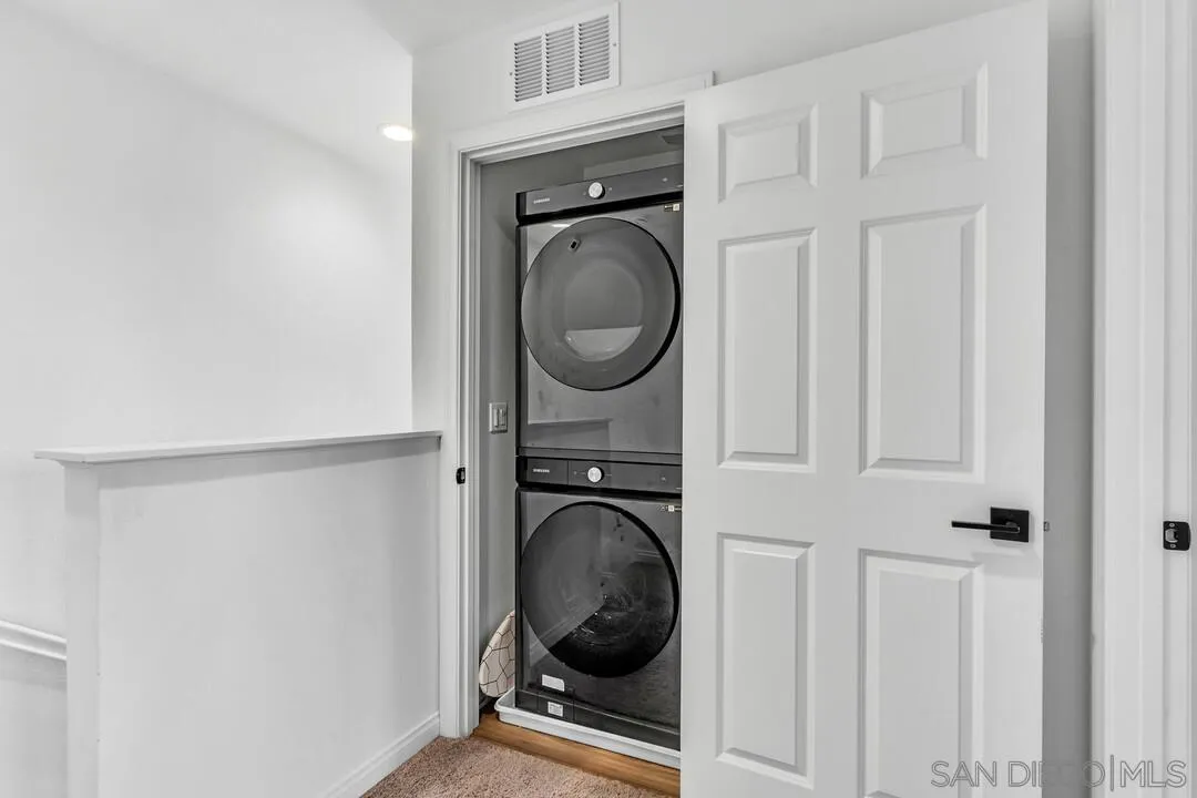 2811 Safflower Street Spring Valley, CA 91977 - Photo 15 of 28 a utility room with dryer and washer