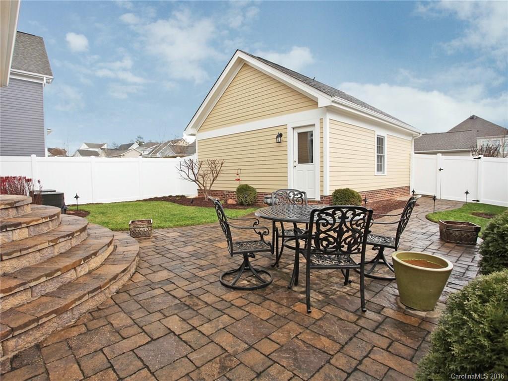 660 Revival Row Fort Mill, SC 29708 - Photo 2 of 24 a view of a patio with table and chairs and potted plants