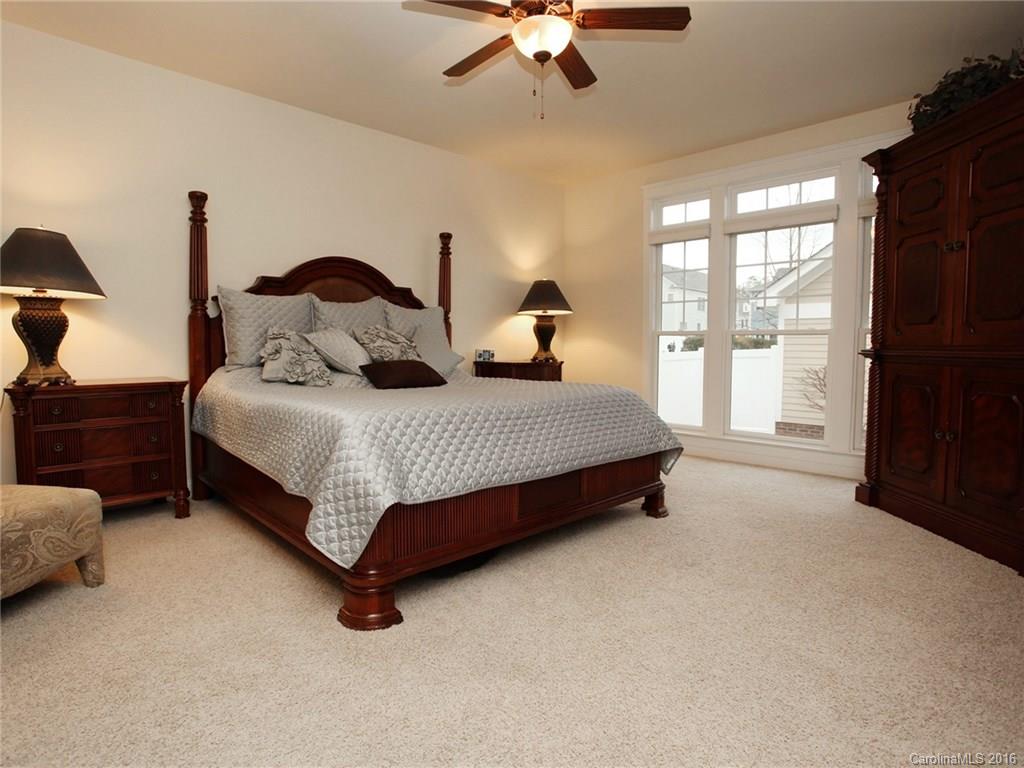 660 Revival Row Fort Mill, SC 29708 - Photo 14 of 24 a bedroom with bed and a large window