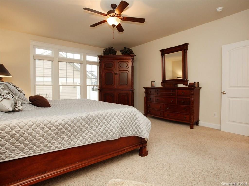 660 Revival Row Fort Mill, SC 29708 - Photo 15 of 24 a bedroom with a bed dresser and a window