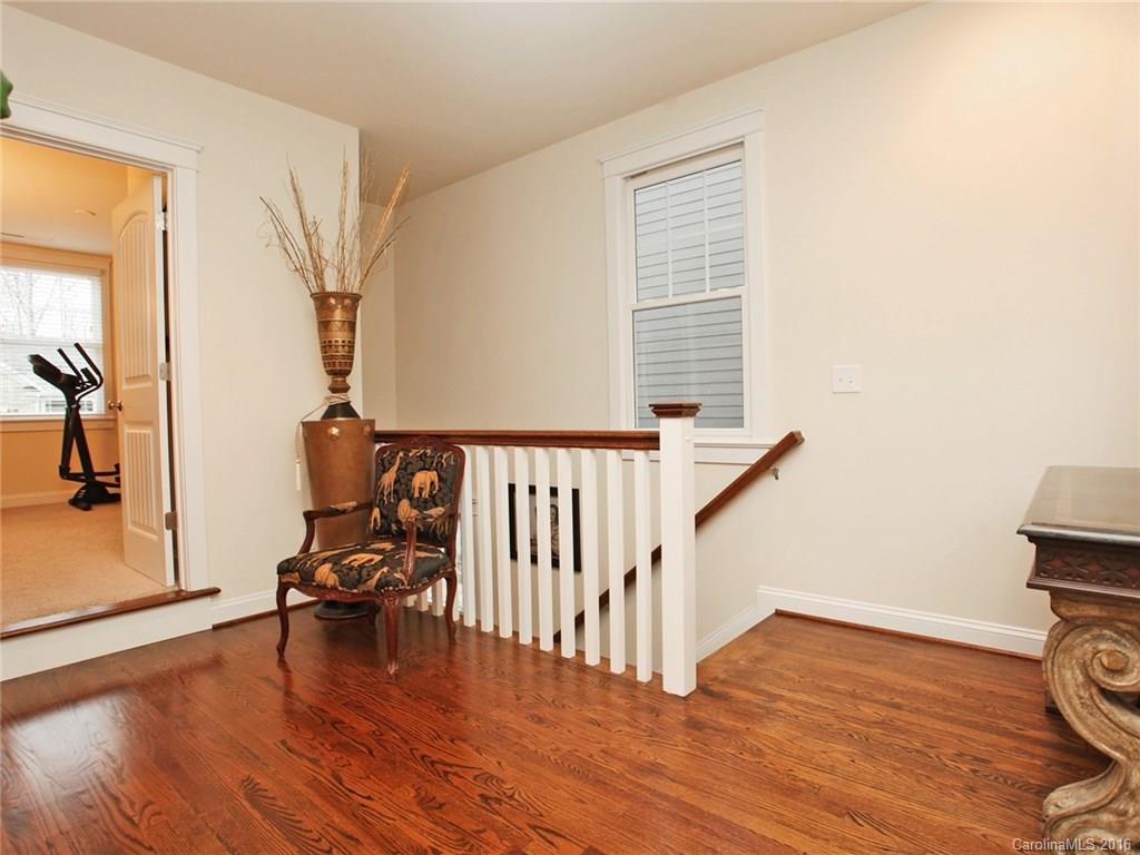 660 Revival Row Fort Mill, SC 29708 - Photo 19 of 24 a view of a livingroom with wooden floor and a window
