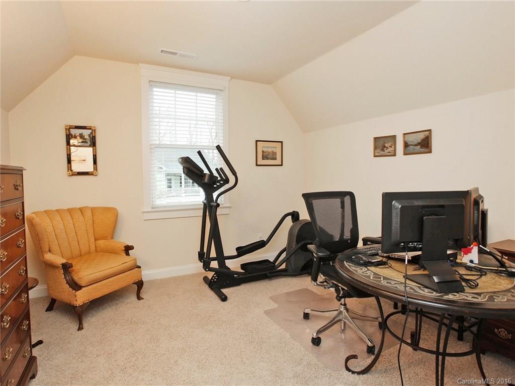 660 Revival Row Fort Mill, SC 29708 - Photo 21 of 24 a view of a workspace with furniture and a window