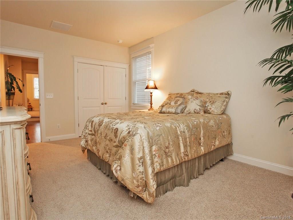 660 Revival Row Fort Mill, SC 29708 - Photo 22 of 24 a bedroom with a bed and a night stand