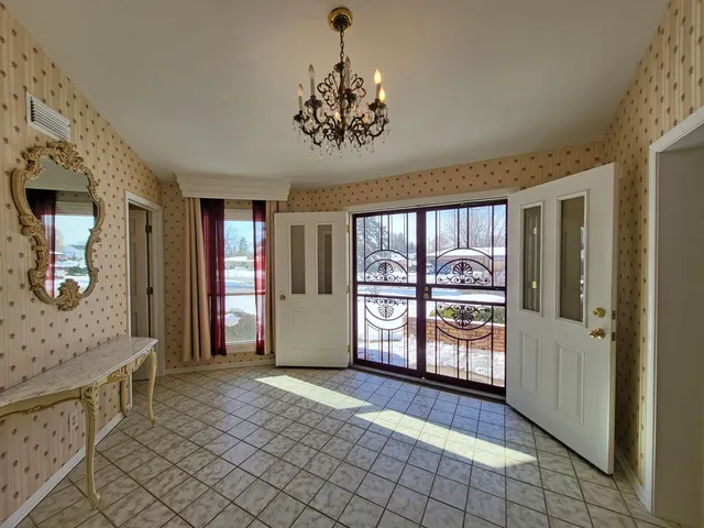 a view of a room with a large window