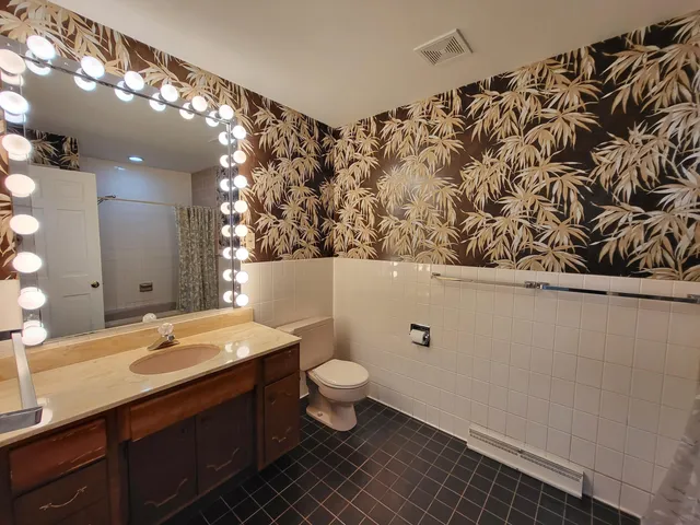 a view of entryway with stairs and wooden floor