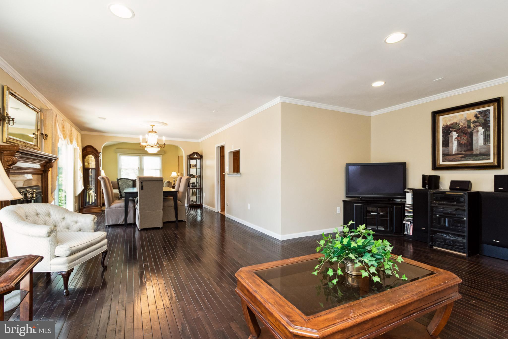 10801 Midsummer Drive Reston, VA 20191 - Photo 7 of 54 Large view of LR/ DR & Family Room.