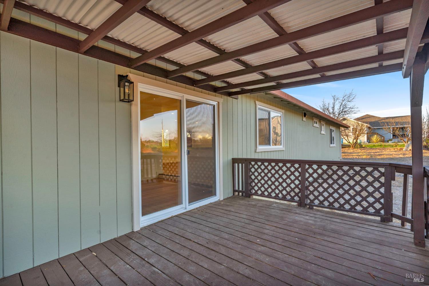 7562 Paddon Road Vacaville, CA 95688 - Photo 44 of 91 Covered decks with panoramic pasture views off family room of main house.