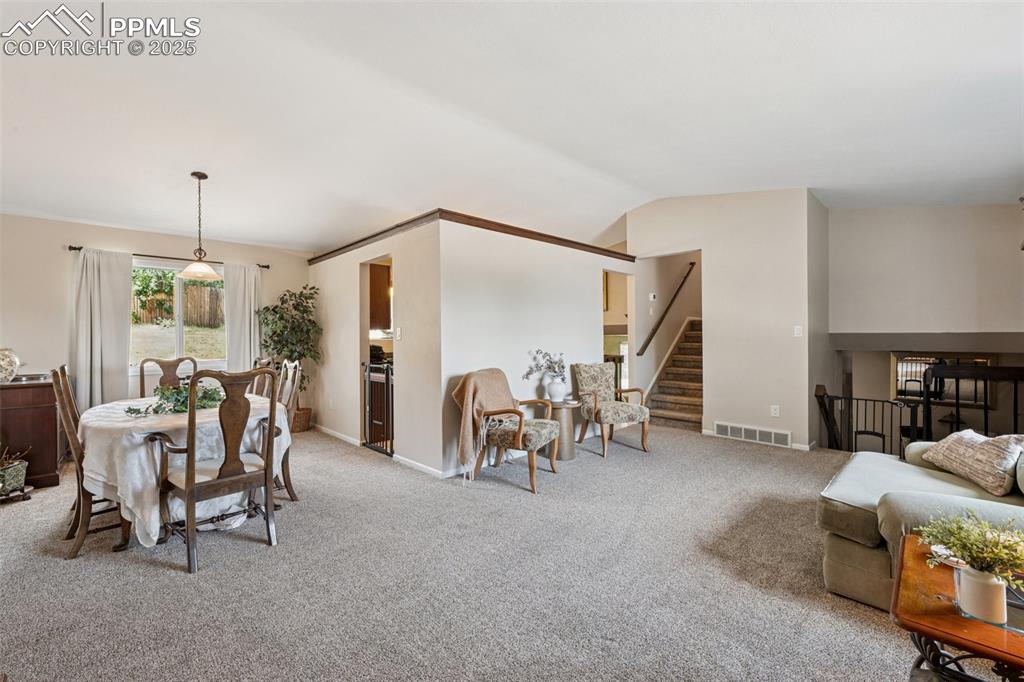 5560 Constitution Avenue Colorado Springs, CO 80917 - Photo 12 of 30 a view of a livingroom with furniture and a window