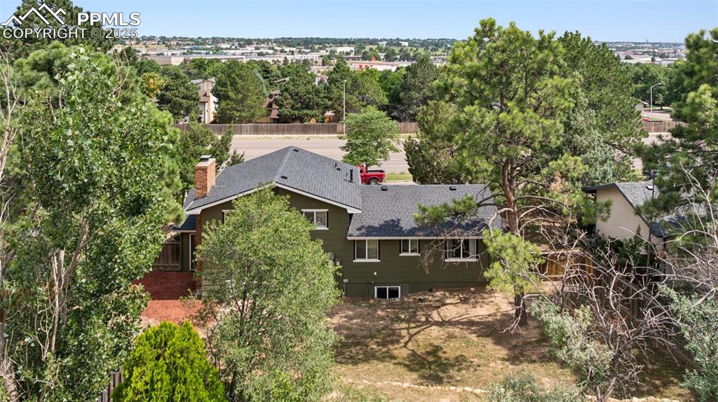 5560 Constitution Avenue Colorado Springs, CO 80917 - Photo 28 of 30 an aerial view of house with yard