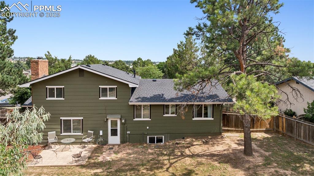 5560 Constitution Avenue Colorado Springs, CO 80917 - Photo 29 of 30 a front view of a house with garden