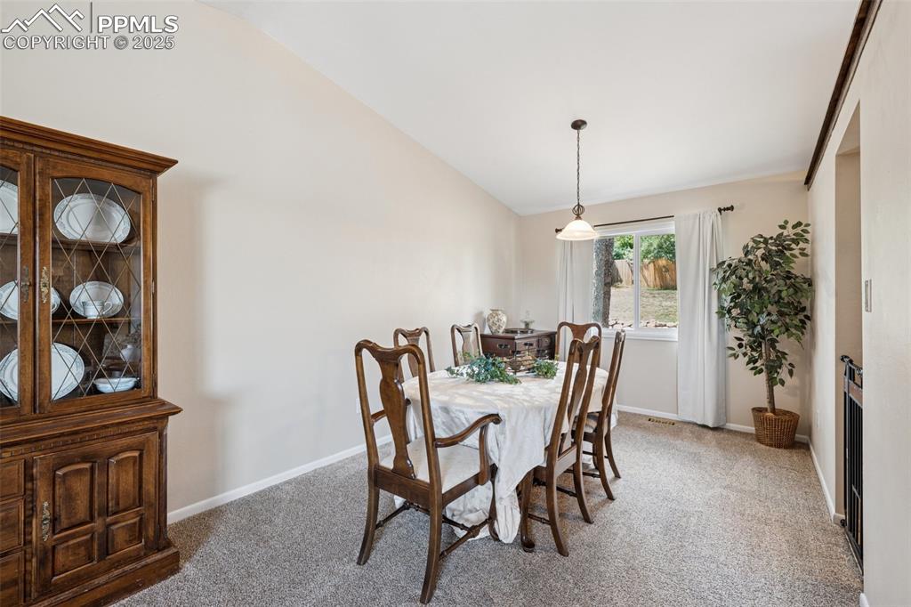 5560 Constitution Avenue Colorado Springs, CO 80917 - Photo 10 of 30 a dining room with furniture and window