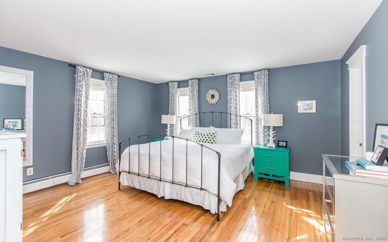 61 High Rock Road Newtown, CT 06482 - Photo 11 of 14 a bedroom with a bed and a view of bedroom