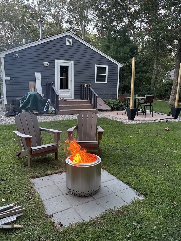 26 Highland Street Mashpee, MA 02649 - Photo 3 of 20 a view of outdoor space yard and patio