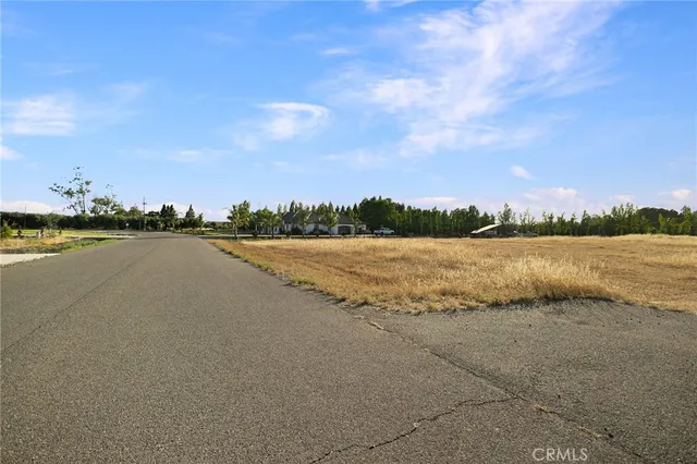 a view of a lake with houses in the back