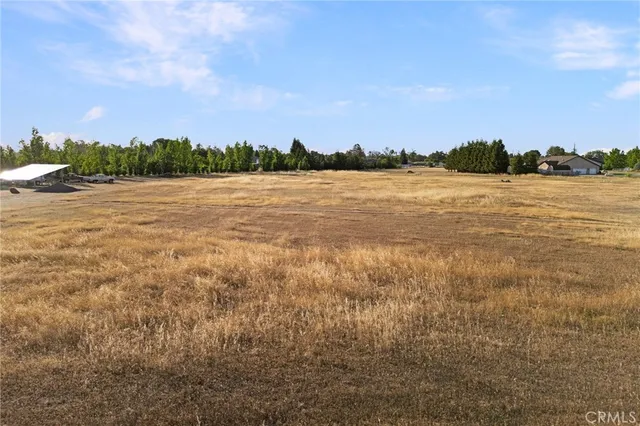 a view of lake with green space