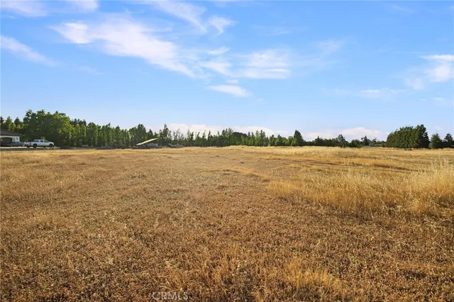 a view of a lake with houses in the back