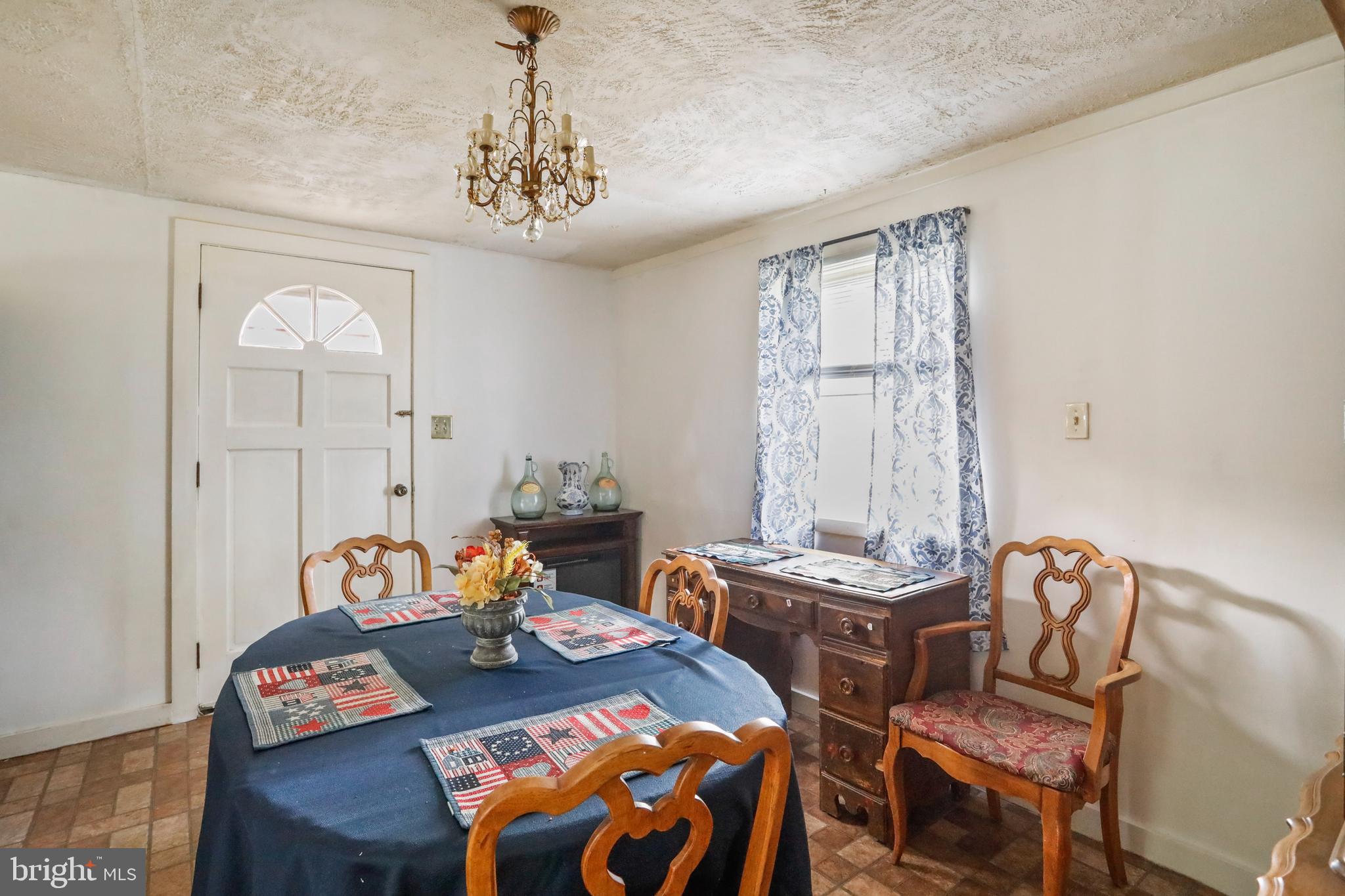 13618 Coppermine Road Union Bridge, MD 21791 - Photo 6 of 29 a view of a workspace with furniture and a window