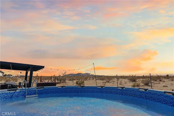 a view of a terrace with a water view
