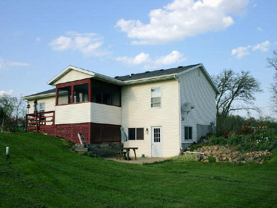 401 South Jackson Road Pecatonica, IL 61063 - Photo 3 of 11 a view of a house with a yard