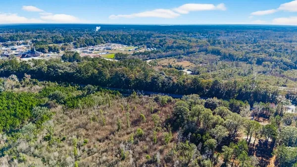 an aerial view of beach and residential houses
