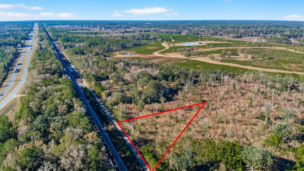 Pony Lane Callahan, FL 32011 - Photo 2 of 17 a view of an outdoor space with a lake