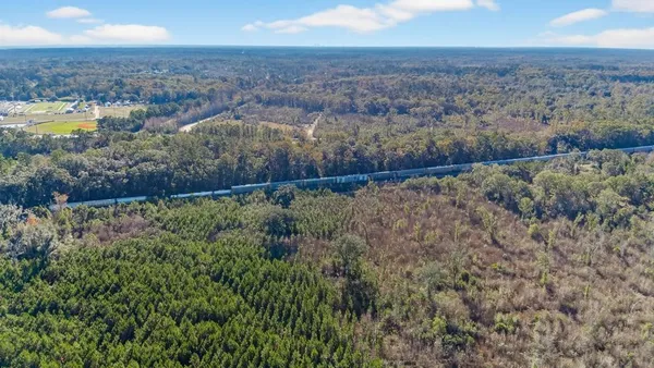 a view of a lake with a yard